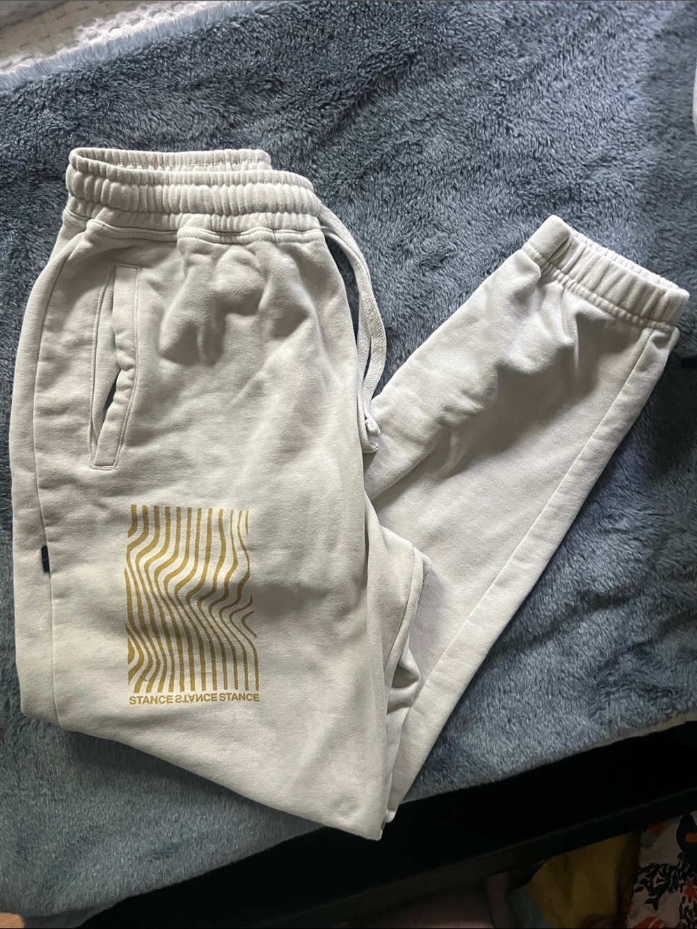 Stance Off-White Sweatpants with Gold Wave Graphic